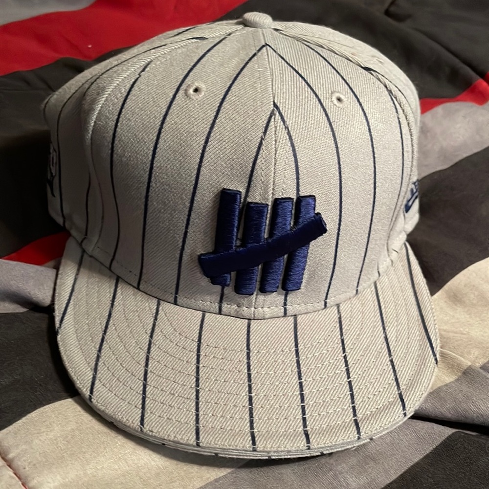 Selling a brand new - no tags - Undefeated Hat - Pinstripes